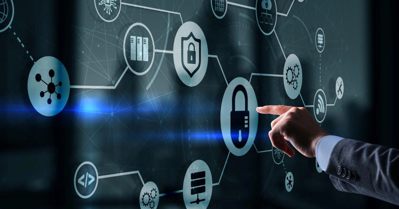 Hand pointing at digital security icons on a futuristic interface, illustrating cybersecurity and data protection concepts.